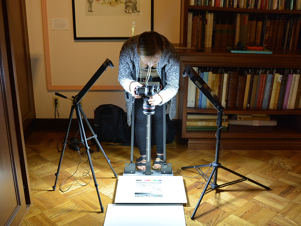 Intern Ivy photographing the collection