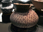 <p>Old Chocolate and Other Surprises: Learning from the May Collection<br />This Hohokam red-on-buff jar has short diagonal lines on the interior of the rim and on the base. The exterior surface is covered with painted abstract elements that possibly represent plants. The date for Hohokam buffware is C.E. 550-1450.</p><p style="text-align: right;"><em>Photograph by Rose Tyson.</em></p>