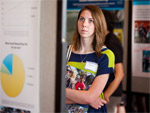 Jessica Peek takes some time to view the work of her fellow students.