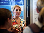 Allison MacKrell answers questions from fellow students about her biology research. 