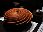 <p>Old Chocolate and Other Surprises: Learning from the May Collection<br />Towa artist Damian Toya made this ceramic melon swirled seed jar in 2006. She is from Jemez Pueblo, NM. The swirls are precise and uniform, and a micaceous slip was used which gives it a sparkling appearance.</p><p style="text-align: right;"><em>Photograph by Rose Tyson.</em></p>