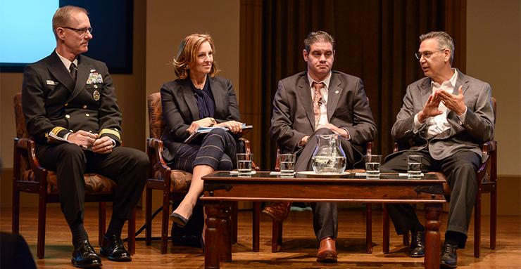 Navy Rear Admiral Yancy B. Lindsey, San Diego Housing Commission’s Deborah Ruane, City of San Diego's David Graham, and Ernest W. Hahn Chair of Real Estate Finance Norm Miller speak during a panel.