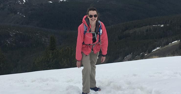 Dr. Chapman stands in the snow in Yellow Stone.