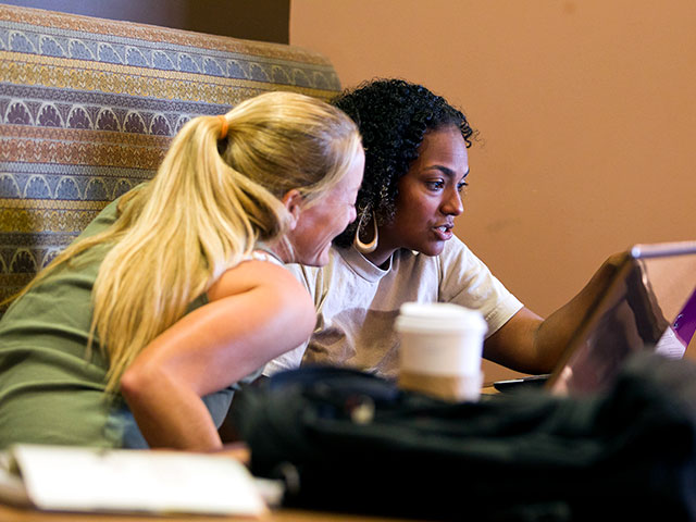 Students work together in Bert's Bistro on the USD campus