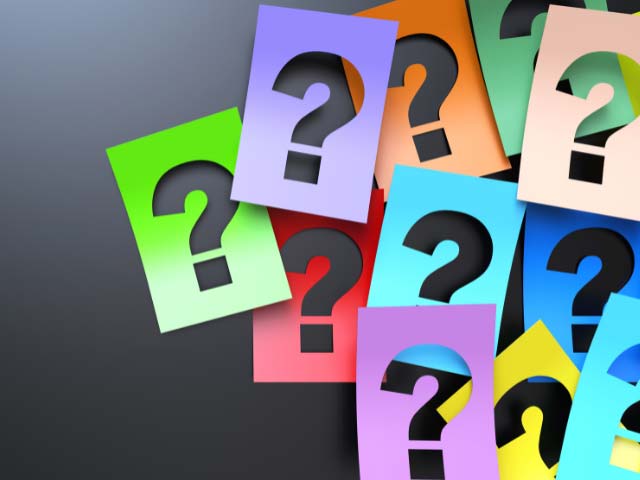 question marks on a canvas
