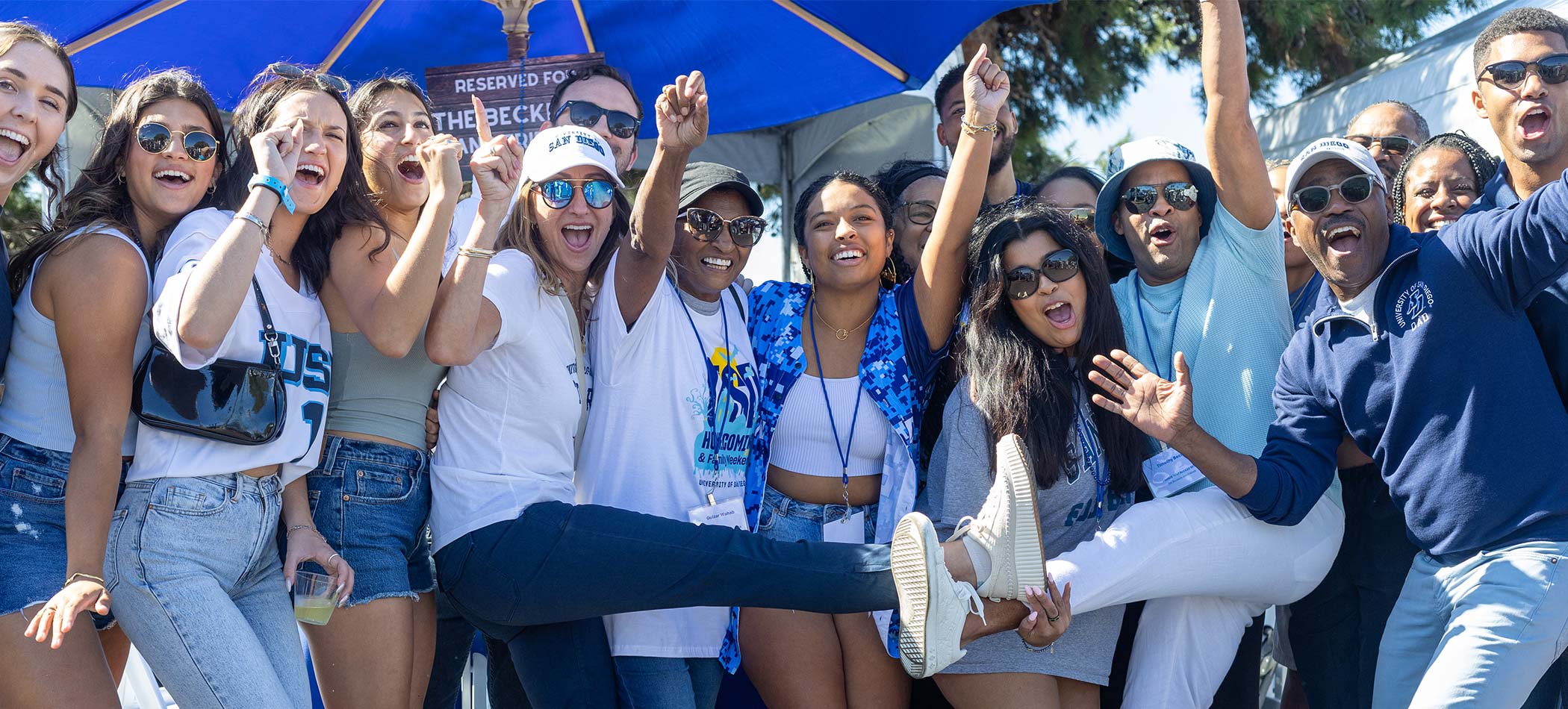 usd student cheering in the stands at an athletic event