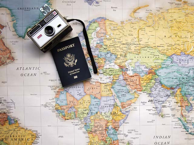A map of the world with a camera on top