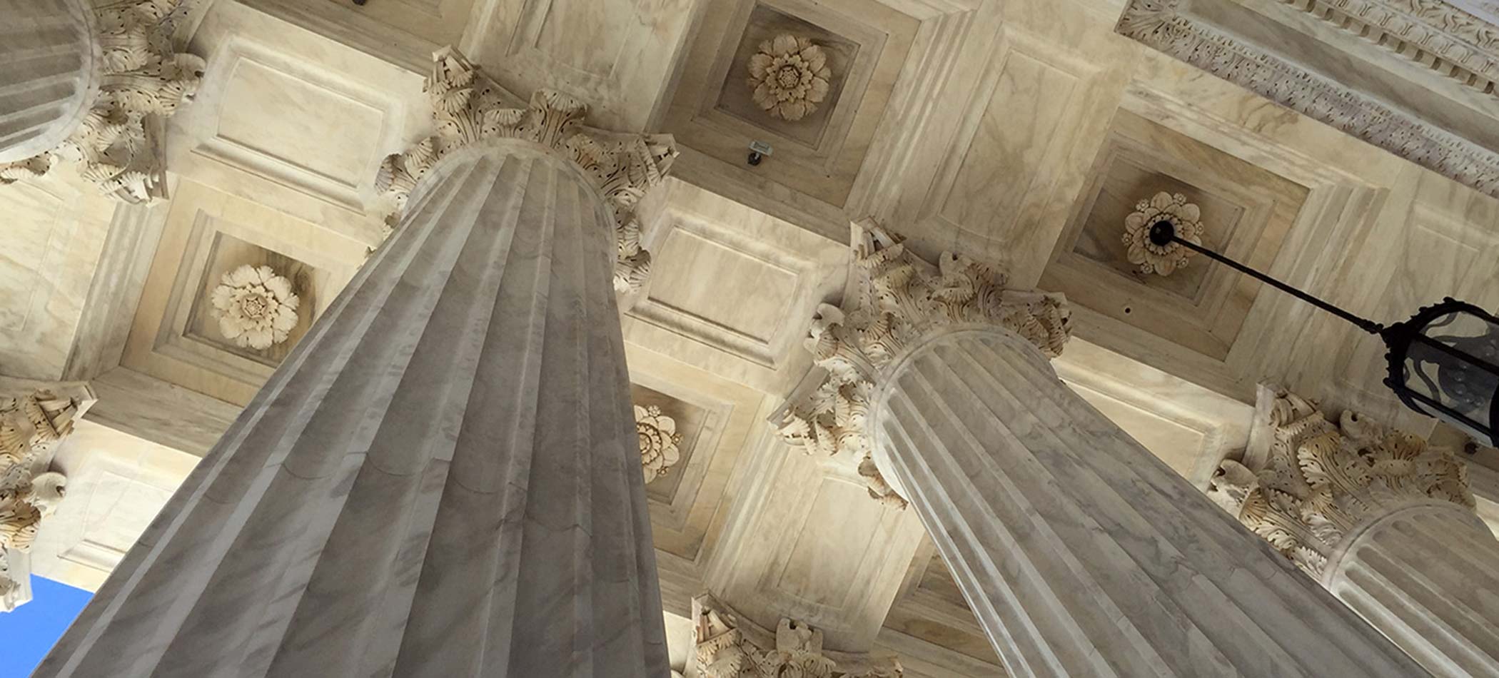 Under the arches of the Supreme Court entrance in Washington D.C.