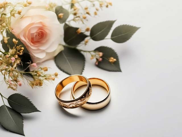 rings and flowers on a table