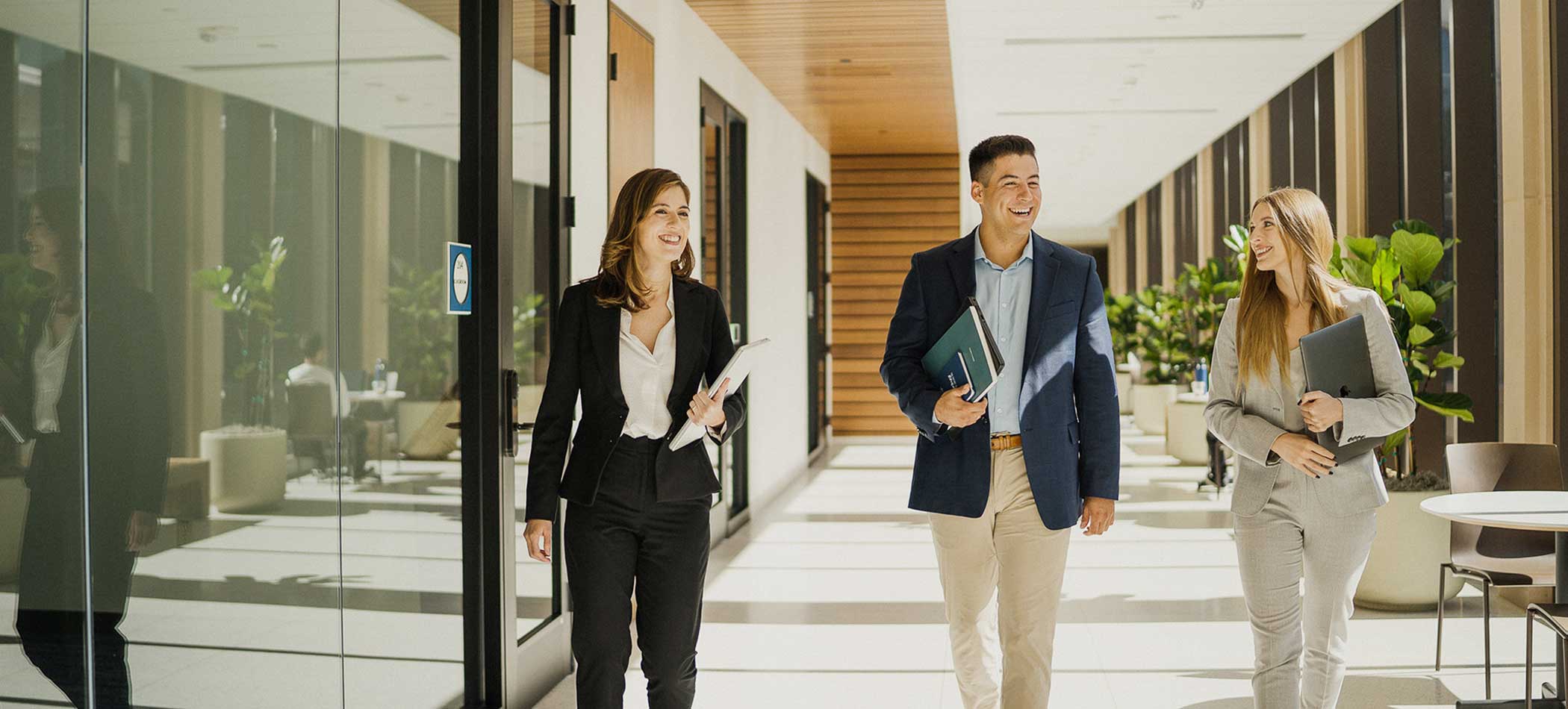 Two professors talking on campus