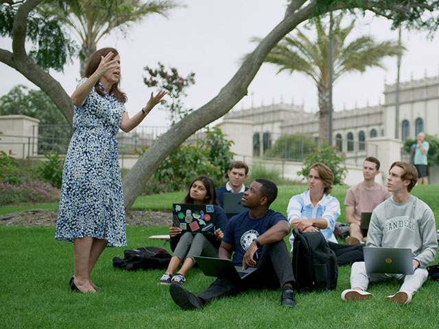 A class being taught outside