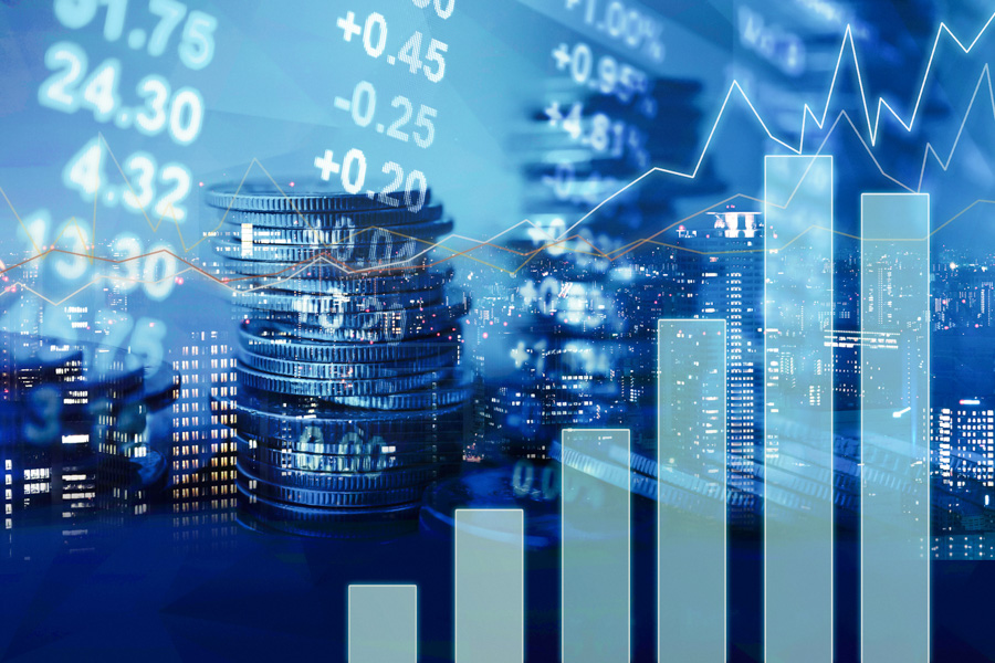 Blue graphic of a cityscape overlaid with stacks of coins and bar charts