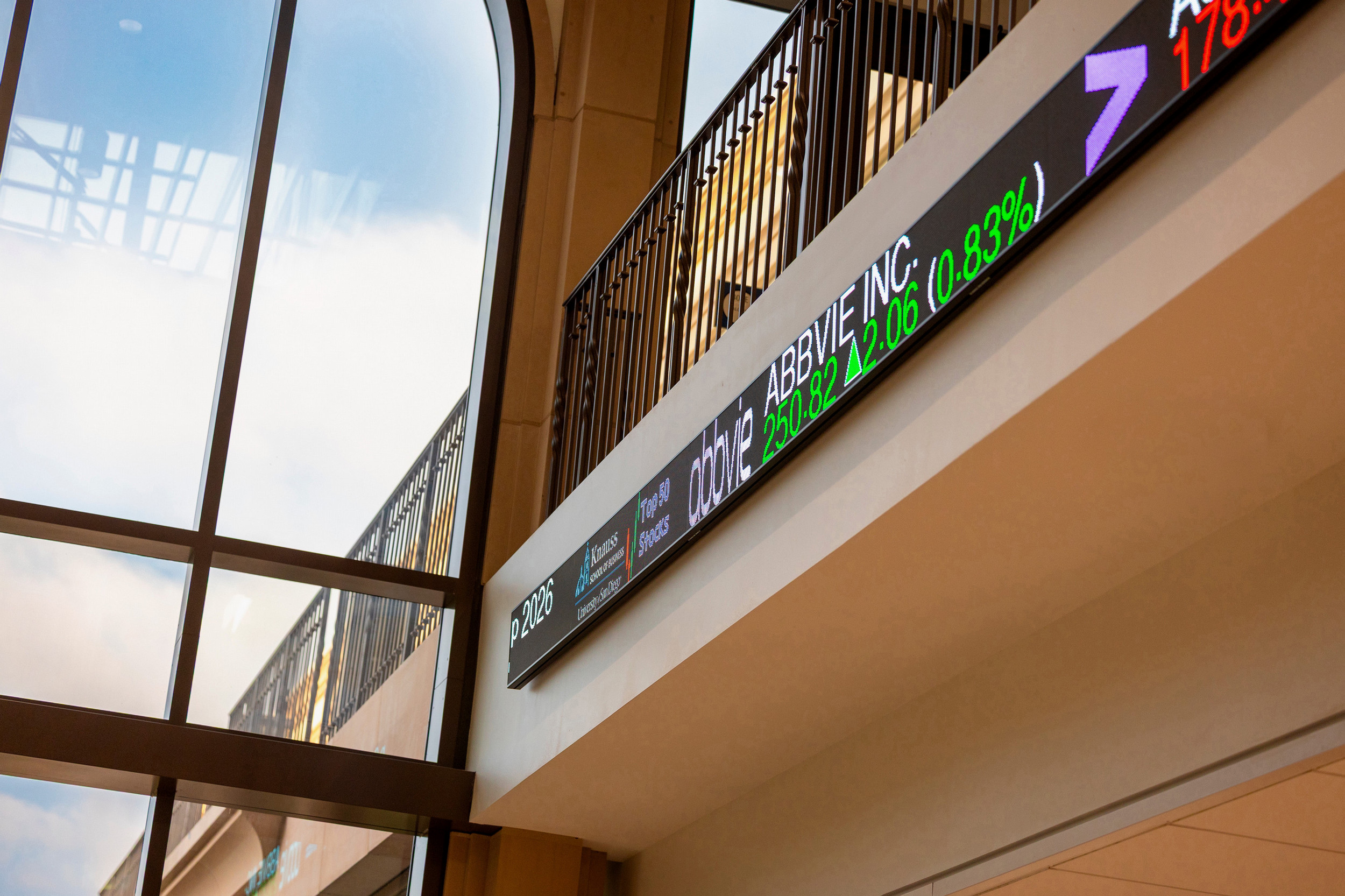 Digital stock ticker running along second floor of Knauss Center for Business Education