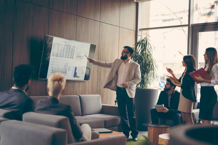 CEO gives a presentation to a group of investors