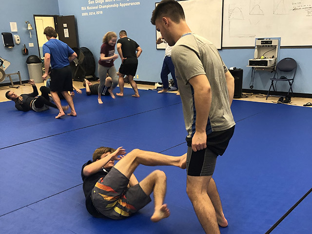 People practicing martial arts