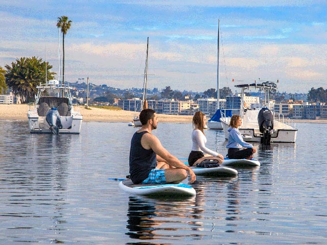 People sailing in the bay
