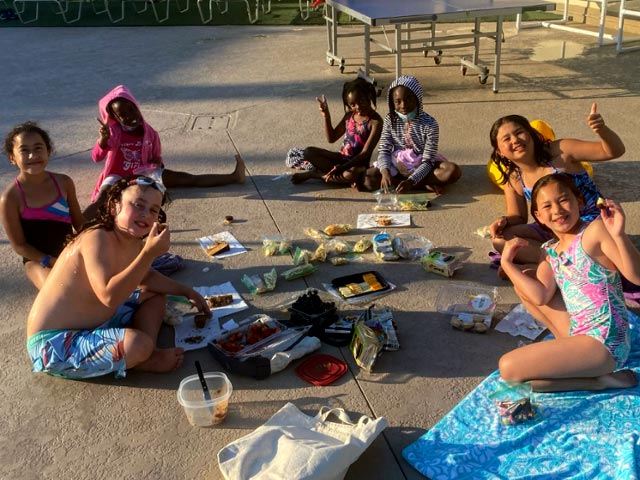 Kids at a summer swim lesson