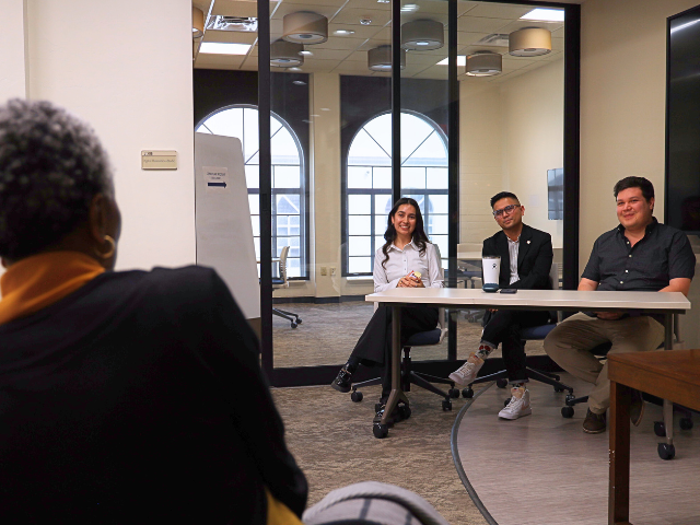 2024 Postdoc Research Panel talking to Program Committee Co-chair Pauline Powell