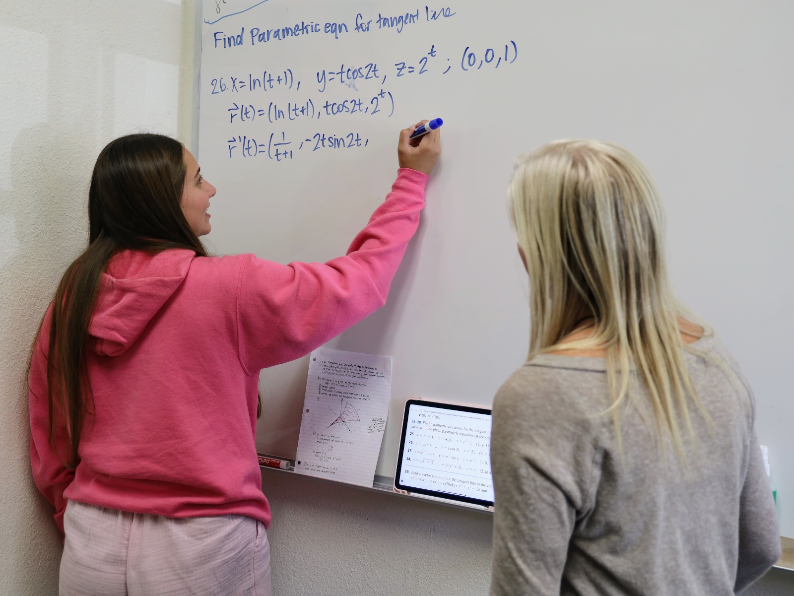 Professor Hoffoss with a student during office hours.