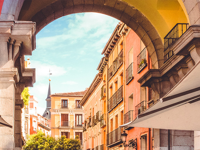 A rooftop and colorful houses