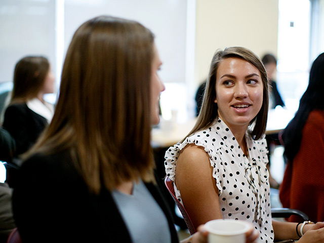Students networking in a seminar