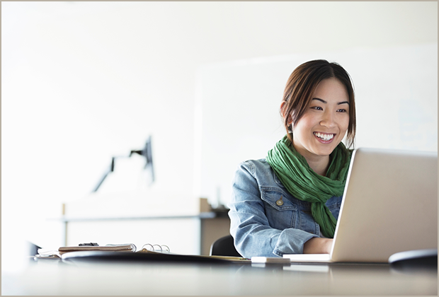 A person viewing content on a laptop.