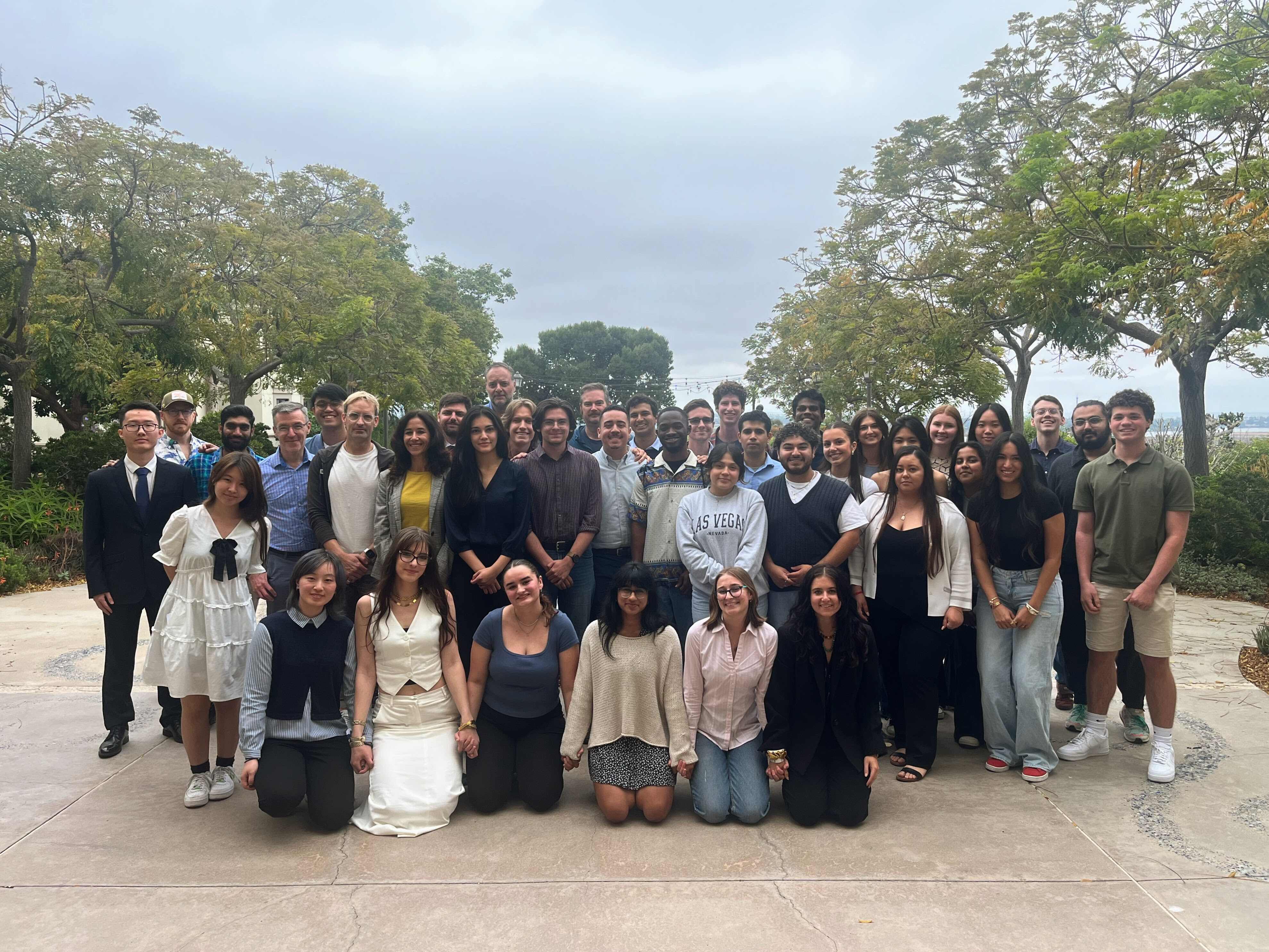 Group photo of the 2024 PPEL Summer School participants in the Garden of the Sea at USD.