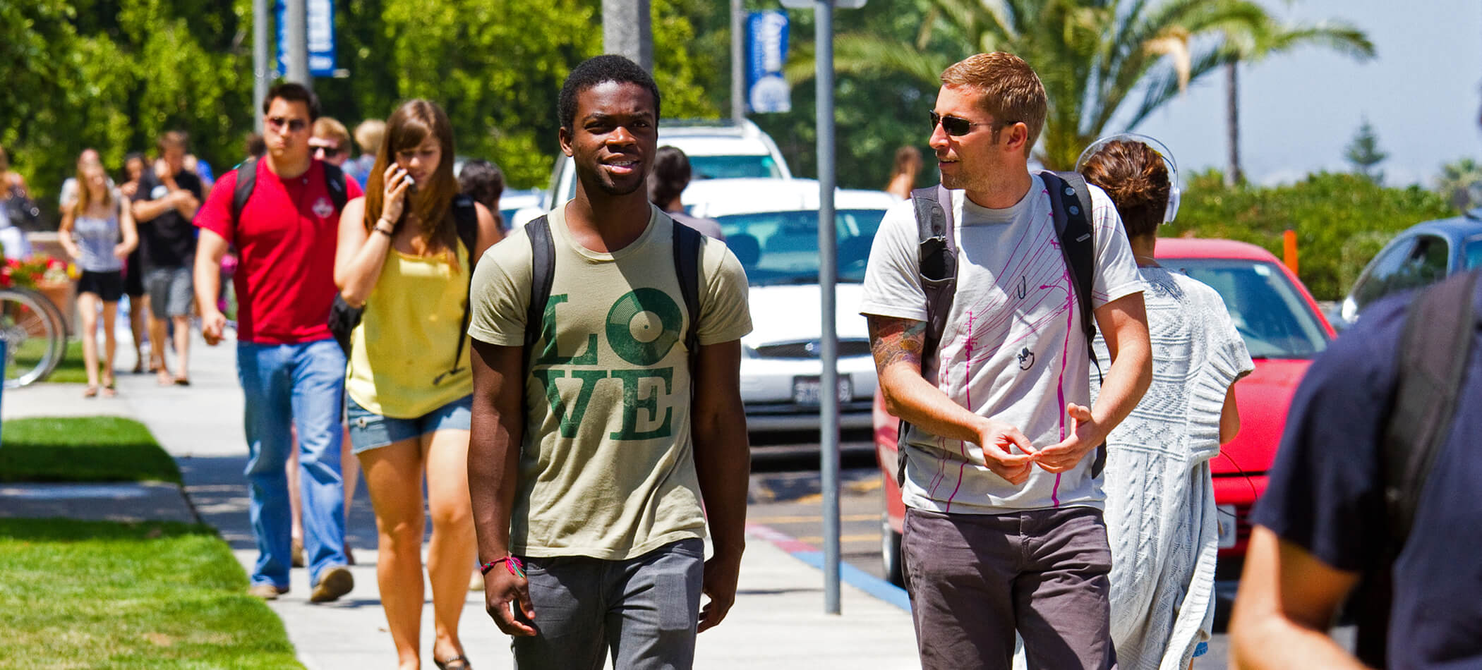USD students walking on campus
