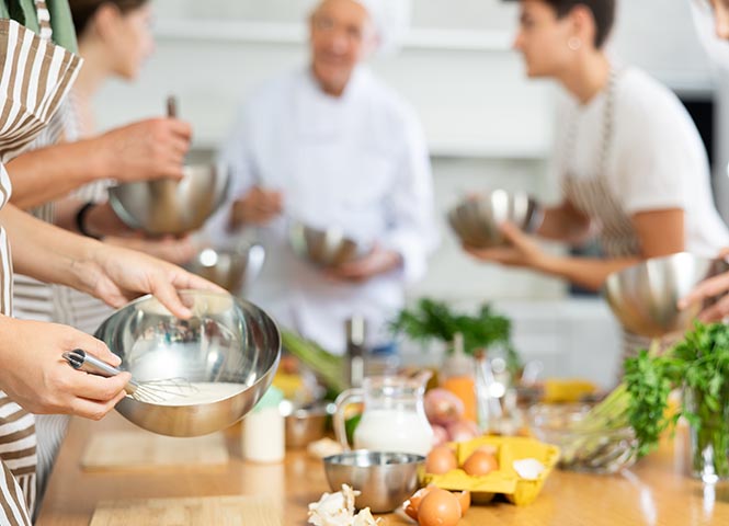 People cooking in a pro kitchen