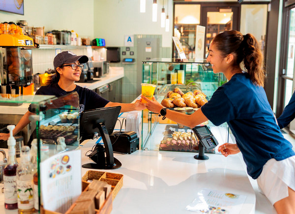 Student ordering juice at Crush Juice Co.