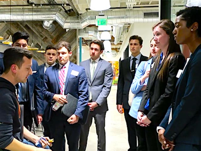 Students talking about a project
