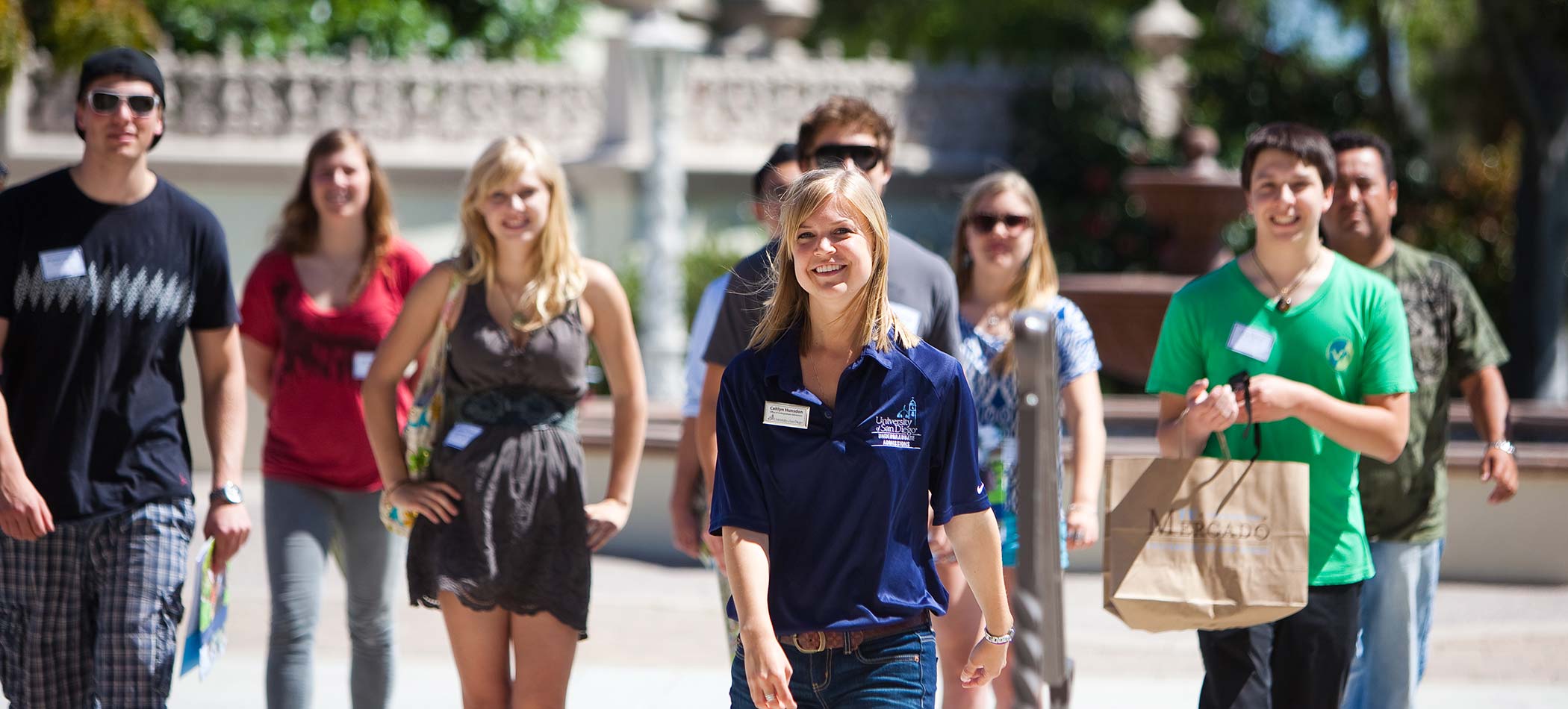 Prospective students walking on campus during a tour