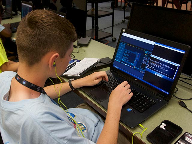 Male student working on computer