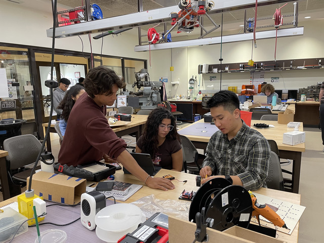 Students working inside Donald's Garage