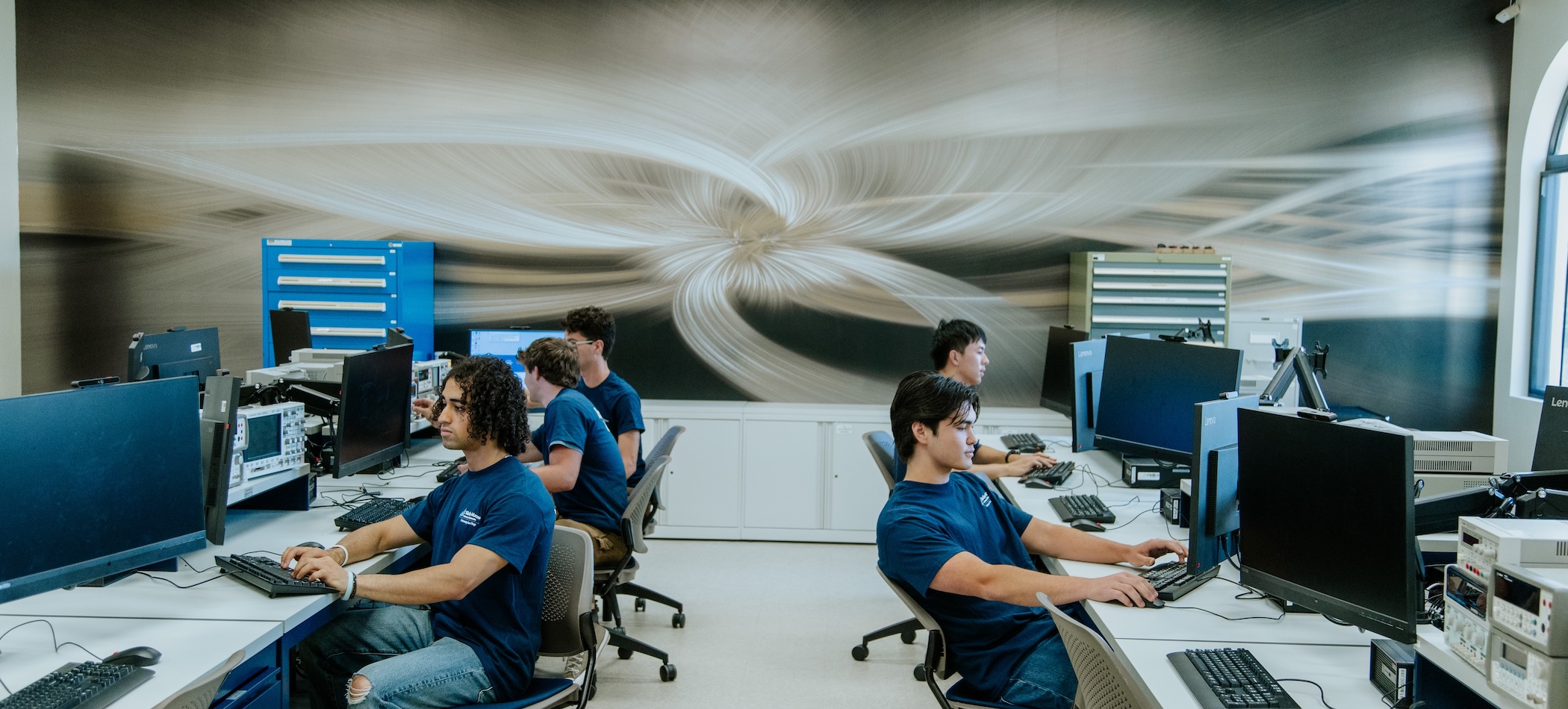male students at computers in BEC 205 electrical engineering lab
