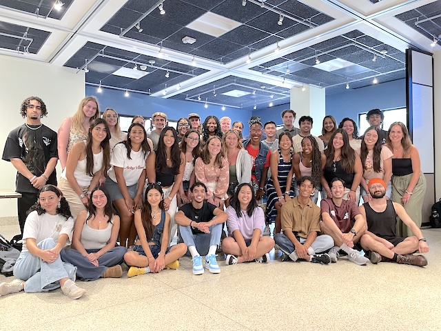 A student group posting for the camera