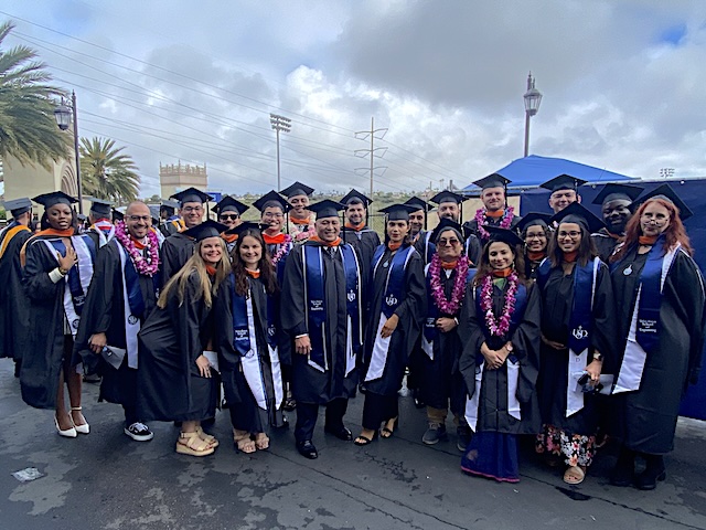 Cybersecurity grads celebrating