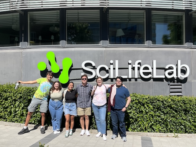 students in front of lab