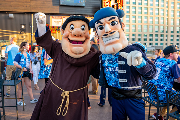 Mascots posing for the camera at the Petco Bash event