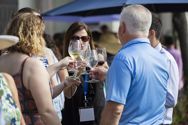 People toasting at a USD wine classic event