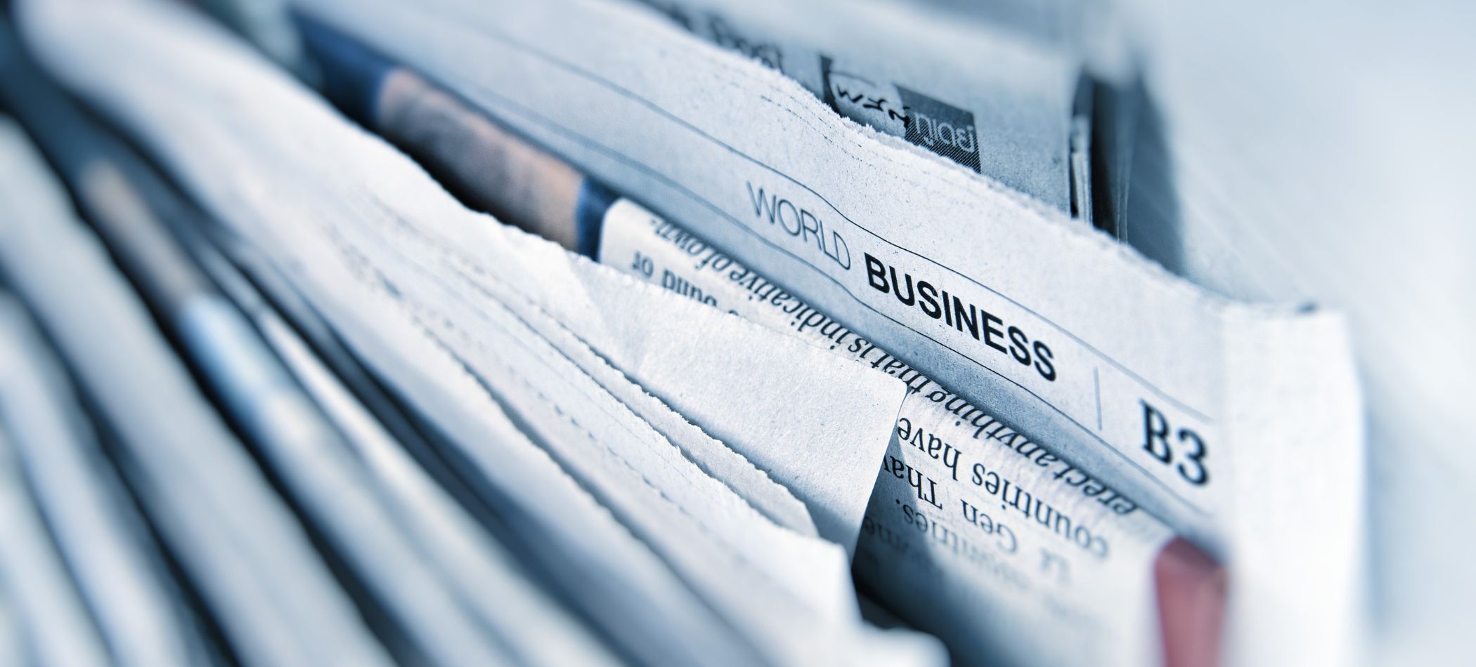 Newspapers in a bin
