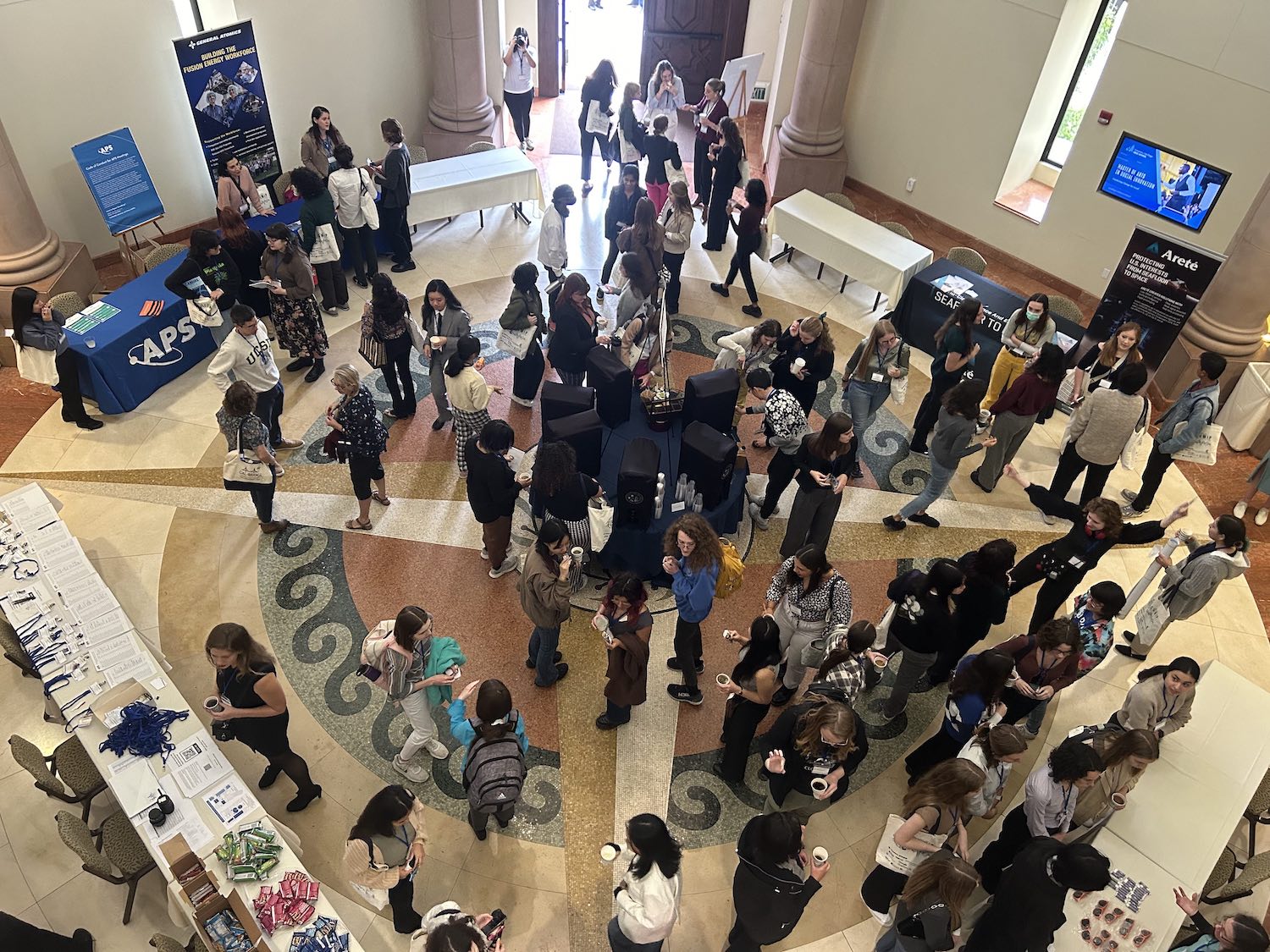 A faculty member talking with students