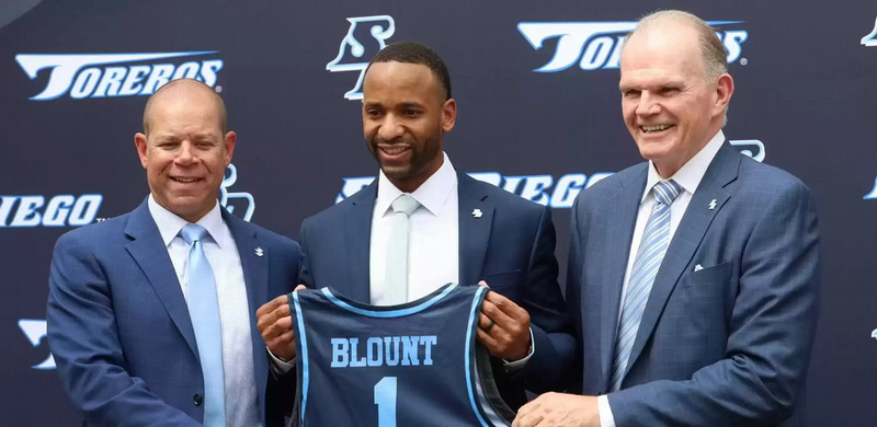 image of USD president James Harris introducing Blount at a press conference