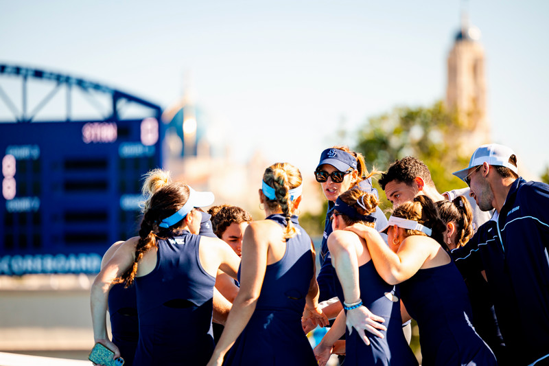 USD women's tennis team with coach