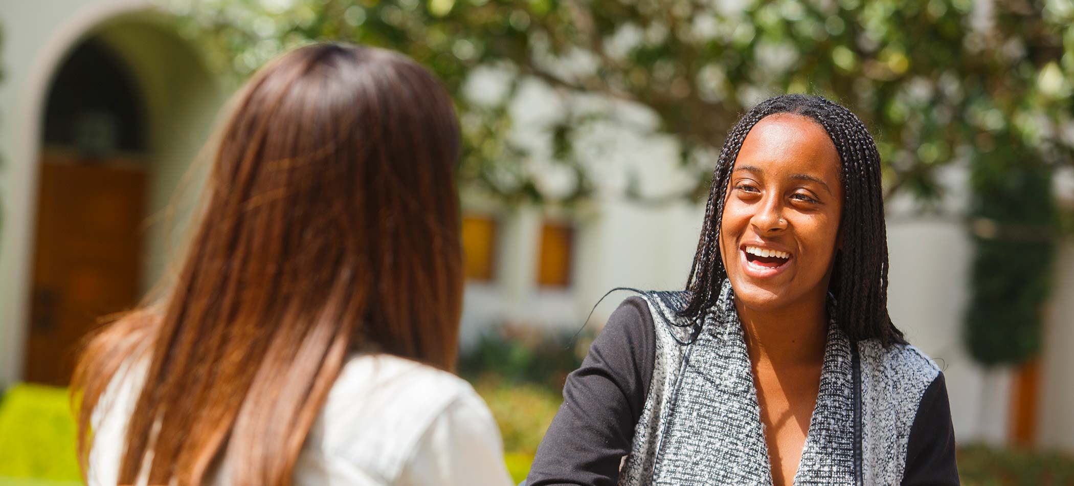 employees talking on campus