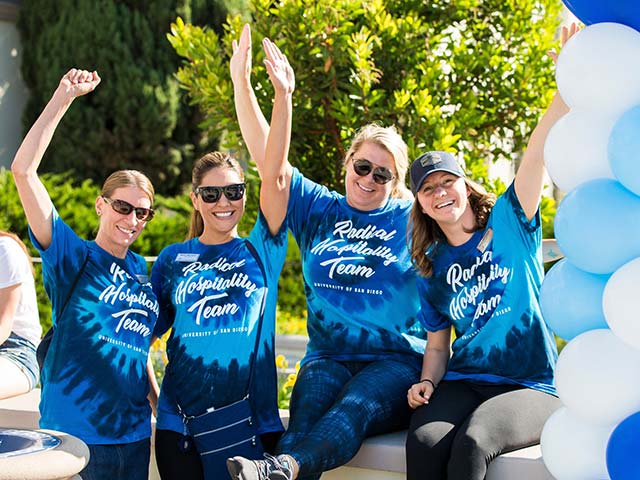 employees in a group at an event