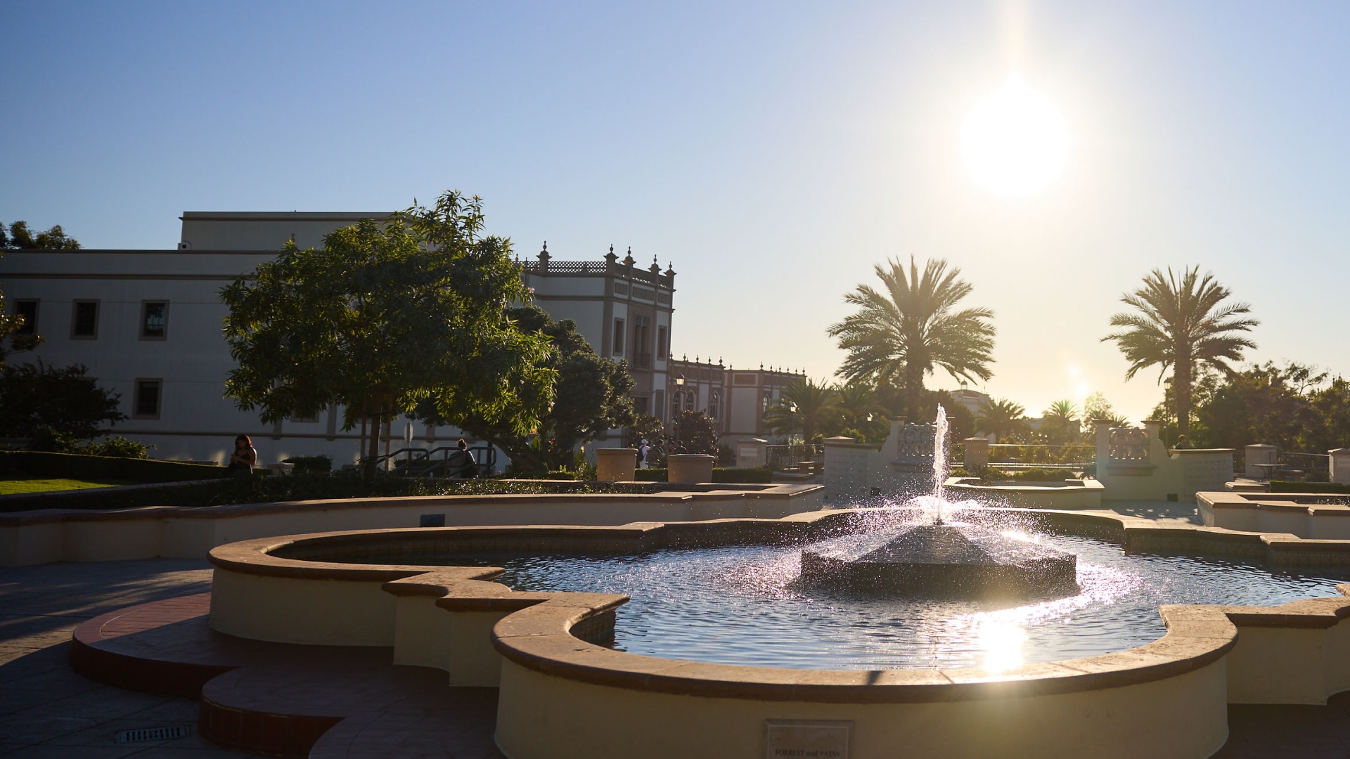 water fountain at sunset