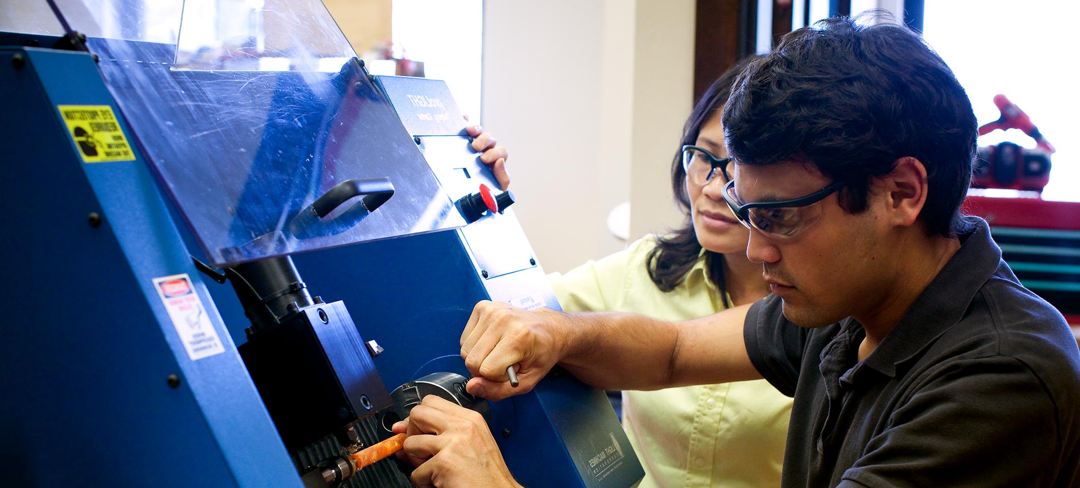 An engineering professor working with a student