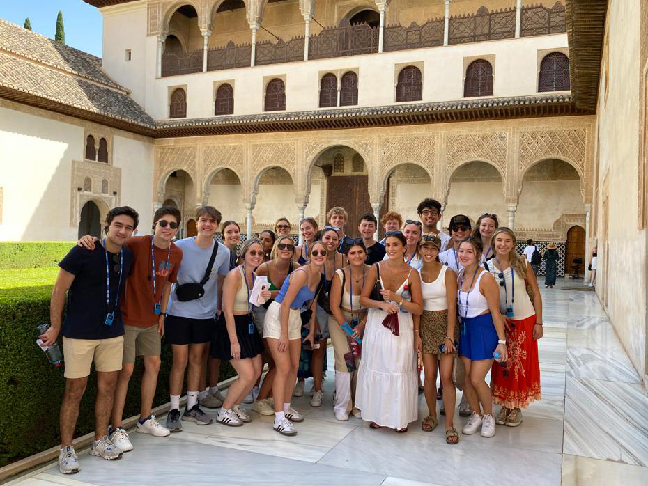 USD students take a cohort photo while abroad in Europe.