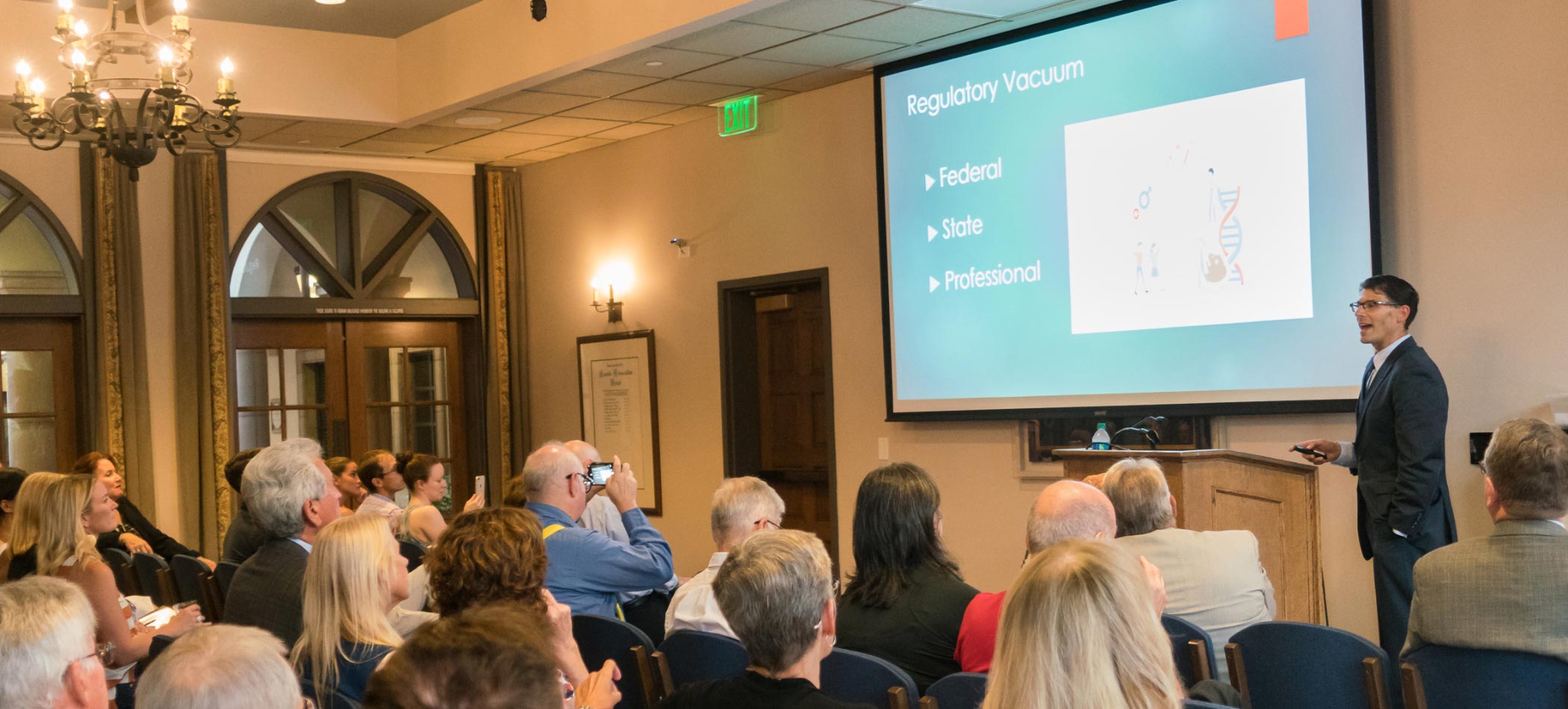 A faculty member from the school of law presenting to an audience